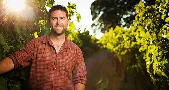 Grant Long in vineyard