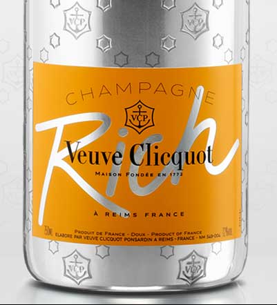 Rich Veuve Cliquot label on champagne bottle