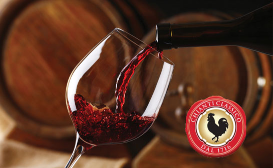 pouring wine in glass with wine casks in background and chianti classico logo in front